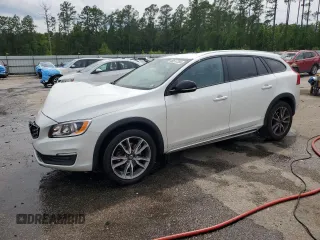 2018 Volvo V60 with VIN YV440MWKXJ2058198, listed as a Copart auction lot 58517355 with 98,279 mi miles and Salvage title. Bid and sale history available at DreamBid. Image 1.