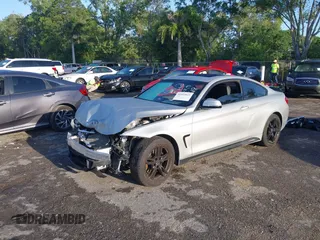 2015 BMW 4 Series 428i xDrive z VIN WBA3N9C56FK246118, wystawiony jako IAAI lot #41923623 z przebiegiem 113 207 mil mil oraz . Historia ofert i sprzedaży dostępna na DreamBid. Obrazek 2.