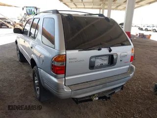 1999 Isuzu Rodeo S with VIN 4S2CM58W9X4354789, listed as a IAAI auction lot 42444956 with Not provided miles and . Bid and sale history available at DreamBid. Image 3.