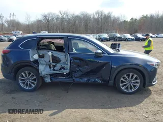 2021 Mazda CX-9 Grand Touring with VIN JM3TCBDY7M0540359, listed as a IAAI auction lot 41711366 with 47,391 mi miles and . Bid and sale history available at carsss.com. Image 13.