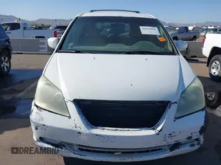 2005 Honda Odyssey EX with VIN 5FNRL38465B081716, listed as a IAAI auction lot 41998956 with 173,182 mi miles and . Bid and sale history available at carsss.com. Image 6.
