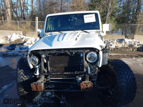 2014 Jeep Wrangler Unlimited Sahara with VIN 1C4HJWEG2EL273813, listed as a IAAI auction lot 41311011 with 96,104 mi miles. Bid and sale history available at carsss.com. Image 12.