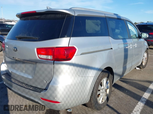 2016 Kia Sedona LX with VIN KNDMB5C11G6188015, listed as a IAAI auction lot 41580251 with 87,888 mi miles. Bid and sale history available at carsss.com. Image 4.