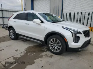 2019 Cadillac XT4 FWD Premium Luxury with VIN 1GYFZCR43KF151044, listed as a Copart auction lot 57912915 with 71,138 mi miles and Salvage title. Bid and sale history available at DreamBid. Image 4.