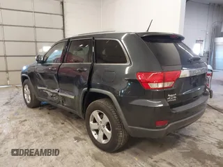 2012 Jeep Grand Cherokee Laredo with VIN 1C4RJFAG5CC351539, listed as a IAAI auction lot 41861533 with 166,909 mi miles. Bid and sale history available at carsss.com. Image 3.