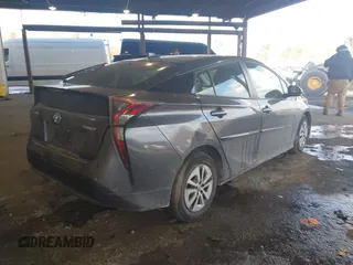 2018 Toyota Prius Two with VIN JTDKARFU3J3054803, listed as a IAAI auction lot 41442350 with 61,989 mi miles. Bid and sale history available at carsss.com. Image 4.