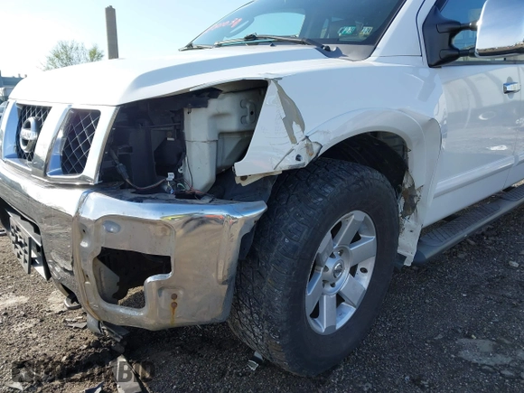 2007 Nissan Titan XE z VIN 1N6AA07B77N244215, wystawiony jako IAAI lot #41880030 z przebiegiem 138 405 mil mil oraz . Historia ofert i sprzedaży dostępna na DreamBid. Obrazek 6.