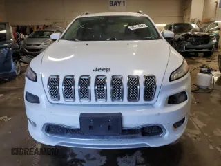 2018 Jeep Cherokee Overland z VIN 1C4PJMJX4JD614218, wystawiony jako Copart lot #69771824 z przebiegiem 59 695 mil mil oraz Szkoda całkowita • Salvage title. Historia ofert i sprzedaży dostępna na DreamBid. Obrazek 5.