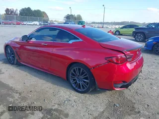 2017 Infiniti Q60 Red Sport 400 with VIN JN1FV7EK0HM610664, listed as a IAAI auction lot 40728910 with 89,817 mi miles and . Bid and sale history available at carsss.com. Image 3.