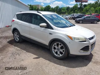 2014 Ford Escape Titanium с VIN 1FMCU0J96EUB49748, выставлен на аукционе IAAI как лот 42366923 с пробегом 176 001 миль миль и . История ставок и продаж доступна на DreamBid. Изображение 1.