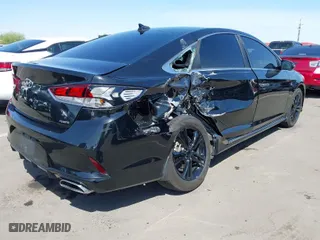 2019 Hyundai Sonata Sport with VIN 5NPE34AF2KH792374, listed as a IAAI auction lot 41987740 with 77,209 mi miles. Bid and sale history available at carsss.com. Image 4.