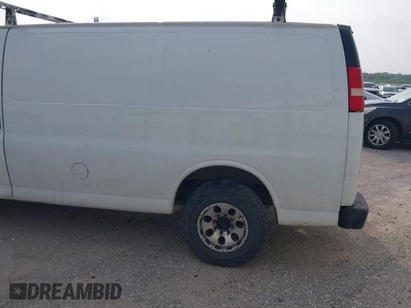 2012 Chevrolet Express Cargo with VIN 1GCWGFFA8C1106882, listed as a IAAI auction lot 42284350 with 227,443 mi miles and . Bid and sale history available at DreamBid. Image 3.