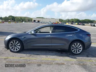 2020 Tesla Model 3 Standard Range Plus with VIN 5YJ3E1EA0LF744046, listed as a IAAI auction lot 41939894 with 102,576 mi miles. Bid and sale history available at carsss.com. Image 14.