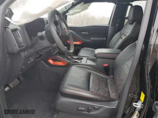 2025 Nissan Frontier PRO-4X with VIN 1N6ED1EK1SN606744, listed as a Copart auction lot 50168825 with 7,434 mi miles and Salvage Title. Bid and sale history available at carsss.com. Image 7.