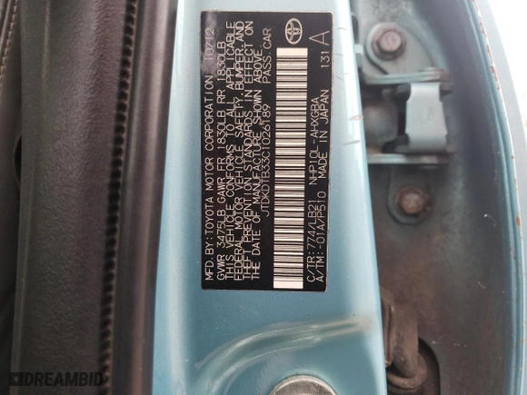 2012 Toyota Prius c One with VIN JTDKDTB33C1026189, listed as a Copart auction lot 42672285 with 142,921 mi miles and Salvage Title. Bid and sale history available at carsss.com. Image 12.