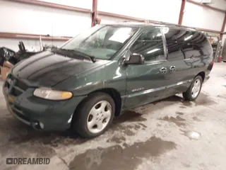 2000 Dodge Caravan SE with VIN 1B4GP44G4YB651833, listed as a IAAI auction lot 41252033 with 185,924 mi miles. Bid and sale history available at carsss.com. Image 2.