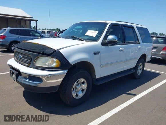1997 Ford Expedition XLT z VIN 1FMFU18L3VLA65297, wystawiony jako IAAI lot #42418325 z przebiegiem 266 297 mil mil oraz . Historia ofert i sprzedaży dostępna na DreamBid. Obrazek 2.