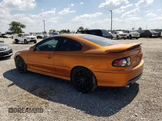 2006 Pontiac GTO with VIN 6G2VX12U76L521089, listed as a Copart auction lot 73374044 with 87,963 mi miles and Salvage Title. Bid and sale history available at carsss.com. Image 2.