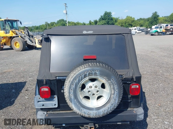 2003 Jeep Wrangler Sahara with VIN 1J4FA59S23P328003, listed as a IAAI auction lot 42833276 with 271,741 mi miles and . Bid and sale history available at DreamBid. Image 16.