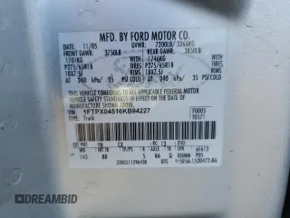 2006 Ford F-150 XLT with VIN 1FTPX04516KB94227, listed as a Copart auction lot 88846855 with 99,475 mi miles and Salvage title. Bid and sale history available at DreamBid. Image 12.