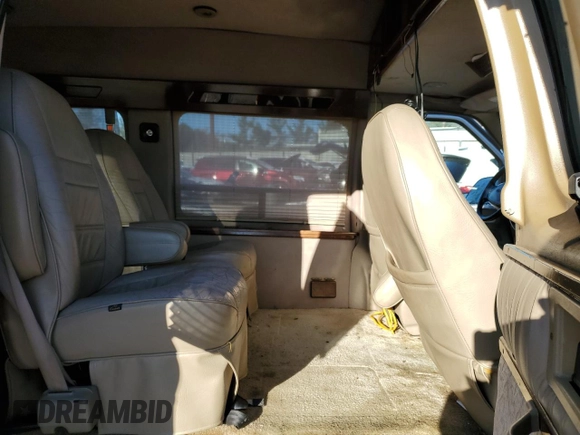 2000 Ford Econoline Cargo with VIN 1FDRE14W9YHA92344, listed as a Copart auction lot 83749374 with 164,823 mi miles and Salvage Title. Bid and sale history available at DreamBid. Image 11.