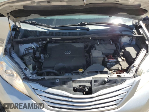 2012 Toyota Sienna with VIN 5TDZK3DC8CS246285, listed as a Copart auction lot 61676185 with 114,700 mi miles and Salvage title. Bid and sale history available at DreamBid. Image 12.
