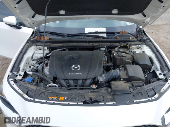 2021 Mazda 3 S z VIN JM1BPAAL6M1310589, wystawiony jako IAAI lot #41889766 z przebiegiem 42 325 mil mil oraz . Historia ofert i sprzedaży dostępna na DreamBid. Obrazek 10.