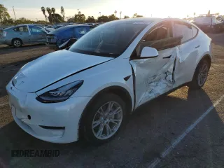2023 Tesla Model Y Long Range z VIN 7SAYGDEE2PA144882, wystawiony jako Copart lot #41812845 z przebiegiem Nie podano mil oraz Szkoda całkowita • Salvage title. Historia ofert i sprzedaży dostępna na DreamBid. Obrazek 1.
