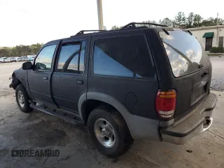 1999 Ford Explorer Eddie Bauer z VIN 1FMDU32X2XZA30166, wystawiony jako Copart lot #77955094 z przebiegiem 212 805 mil mil oraz Szkoda całkowita • Salvage title. Historia ofert i sprzedaży dostępna na DreamBid. Obrazek 2.