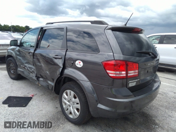 2018 Dodge Journey SE with VIN 3C4PDCAB4JT296083, listed as a IAAI auction lot 41976090 with 63,051 mi miles and . Bid and sale history available at DreamBid. Image 3.