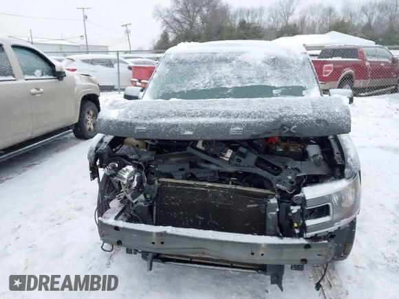 2015 Ford Flex SEL with VIN 2FMGK5C8XFBA05006, listed as a IAAI auction lot 41618527 with 189,404 mi miles. Bid and sale history available at carsss.com. Image 12.