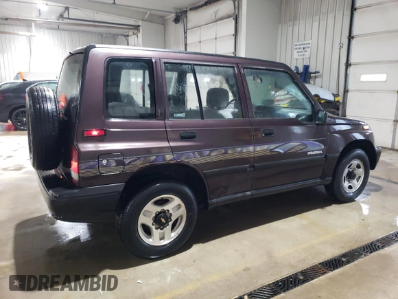 1998 Chevrolet Tracker z VIN 2CNBJ1362W6919635, wystawiony jako Copart lot #56894355 z przebiegiem 140 298 mil mil oraz Szkoda całkowita • Salvage title. Historia ofert i sprzedaży dostępna na DreamBid. Obrazek 3.