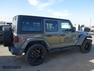 2023 Jeep Wrangler 4xe Sahara with VIN 1C4JJXP68PW661190, listed as a IAAI auction lot 41816483 with 41,877 mi miles. Bid and sale history available at carsss.com. Image 13.