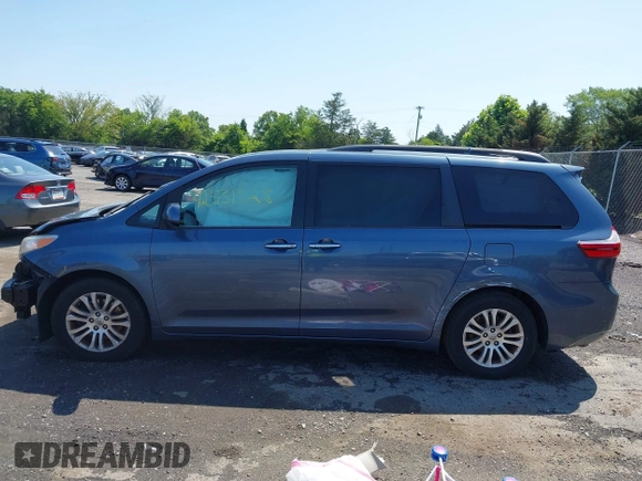 2015 Toyota Sienna XLE with VIN 5TDYK3DC0FS649998, listed as a IAAI auction lot 42531828 with 111,539 mi miles and . Bid and sale history available at DreamBid. Image 15.
