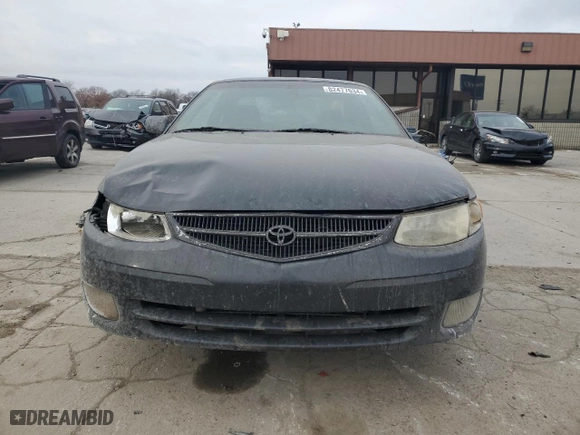 2000 Toyota Camry Solara SE with VIN 2T1CF22P5YC294384, listed as a Copart auction lot 82477634 with 267,469 mi miles and Salvage Title. Bid and sale history available at carsss.com. Image 5.