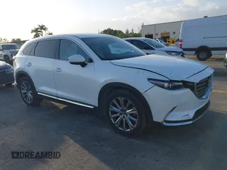2023 Mazda CX-9 Signature with VIN JM3TCBEY6P0648037, listed as a IAAI auction lot 41711856 with 46,661 mi miles and . Bid and sale history available at DreamBid. Image 1.