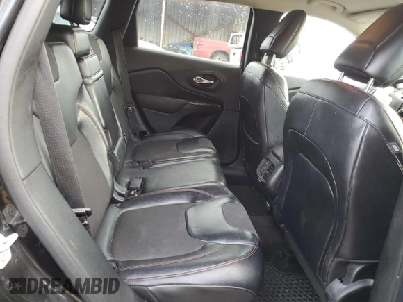 2015 Jeep Cherokee Trailhawk with VIN 1C4PJMBS9FW521872, listed as a Copart auction lot 55338955 with 146,602 mi miles and Salvage title. Bid and sale history available at DreamBid. Image 12.