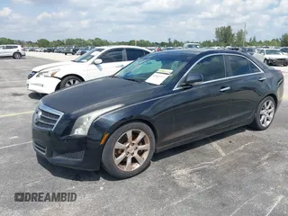 2013 Cadillac ATS Luxury with VIN 1G6AB5RX5D0154501, listed as a IAAI auction lot 41803721 with 250,976 mi miles and . Bid and sale history available at DreamBid. Image 2.