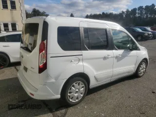 2015 Ford Transit Connect XLT with VIN NM0AE8F77F1202312, listed as a Copart auction lot 87724125 with 100,463 mi miles and Salvage title. Bid and sale history available at DreamBid. Image 3.
