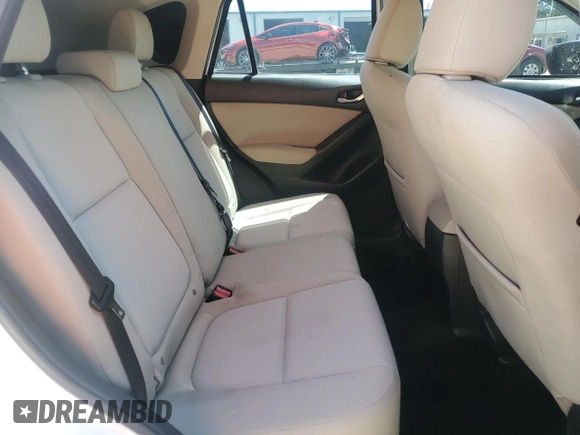 2013 Mazda CX-5 Sport with VIN JM3KE2BE4D0109296, listed as a Copart auction lot 55575555 with 130,112 mi miles and Salvage title. Bid and sale history available at DreamBid. Image 11.