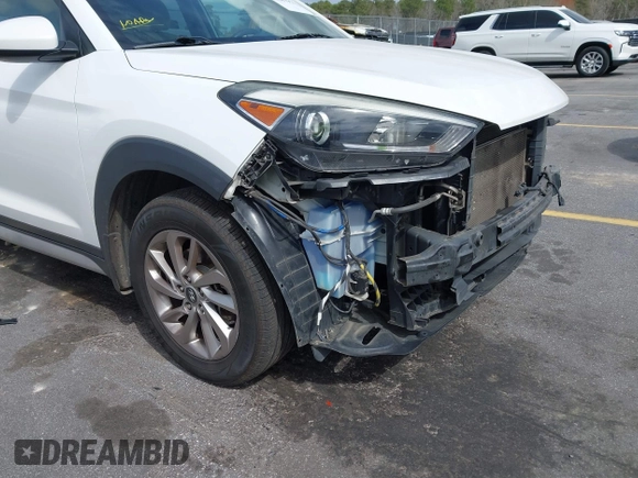 2017 Hyundai Tucson SE with VIN KM8J3CA44HU511581, listed as a IAAI auction lot 41687971 with 111,981 mi miles. Bid and sale history available at carsss.com. Image 19.