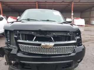 2009 Chevrolet Tahoe LTZ z VIN 1GNFC33J19R282480, wystawiony jako IAAI lot #41536774 z przebiegiem 118 831 mil mil oraz . Historia ofert i sprzedaży dostępna na DreamBid. Obrazek 12.