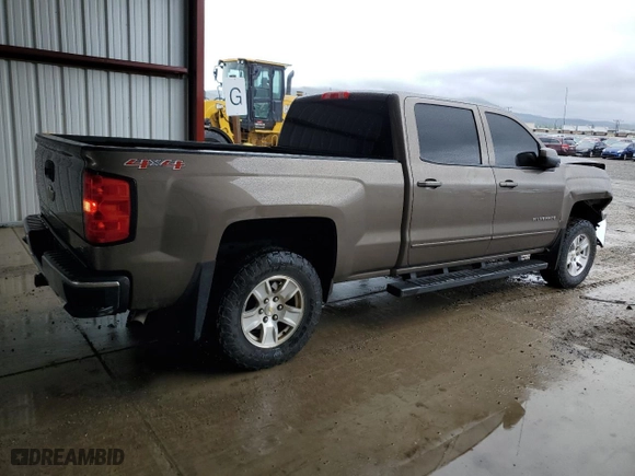 2015 Chevrolet Silverado 1500 LT with VIN 1GCUKREC5FF199913, listed as a Copart auction lot 58476584 with 129,616 mi miles and Salvage Title. Bid and sale history available at carsss.com. Image 3.