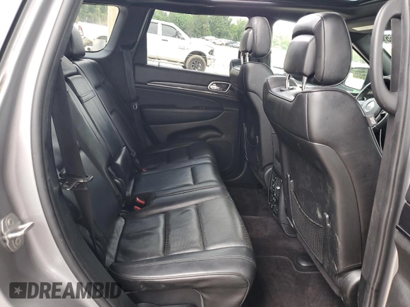 2018 Jeep Grand Cherokee High Altitude with VIN 1C4RJFCT8JC344110, listed as a Copart auction lot 60257065 with 94,917 mi miles and Salvage title. Bid and sale history available at DreamBid. Image 10.