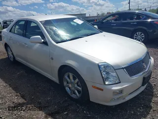 2005 Cadillac STS z VIN 1G6DW677750171537, wystawiony jako IAAI lot #42270330 z przebiegiem 126 889 mil mil oraz . Historia ofert i sprzedaży dostępna na DreamBid. Obrazek 1.