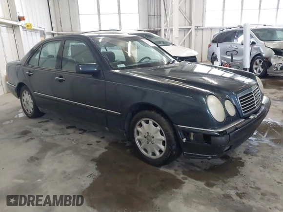 1997 Mercedes-Benz E-Class with VIN WDBJF55F8VA415421, listed as a IAAI auction lot 41536015 with 237,345 mi miles. Bid and sale history available at carsss.com. Image 1.