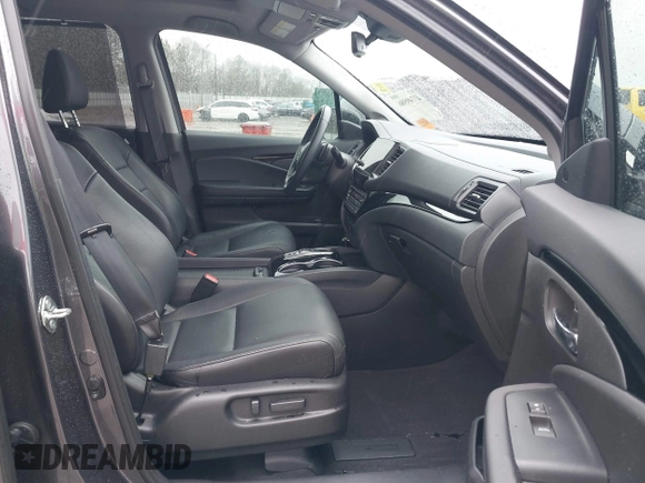 2021 Honda Pilot Touring 8-Passenger with VIN 5FNYF5H9XMB014190, listed as a IAAI auction lot 41749586 with 67,602 mi miles and . Bid and sale history available at DreamBid. Image 5.