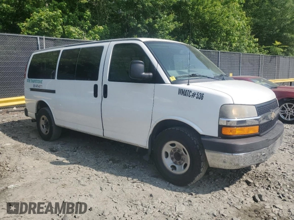 2014 Chevrolet Express Passenger 1LT with VIN 1GAZGYFG9E1209169, listed as a Copart auction lot 59921885 with 310,119 mi miles and Clean title. Bid and sale history available at DreamBid. Image 4.