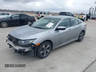 2020 Honda Civic LX z VIN 19XFC2F68LE001482, wystawiony jako IAAI lot #41484428 z przebiegiem 97 604 mil mil oraz . Historia ofert i sprzedaży dostępna na DreamBid. Obrazek 17.
