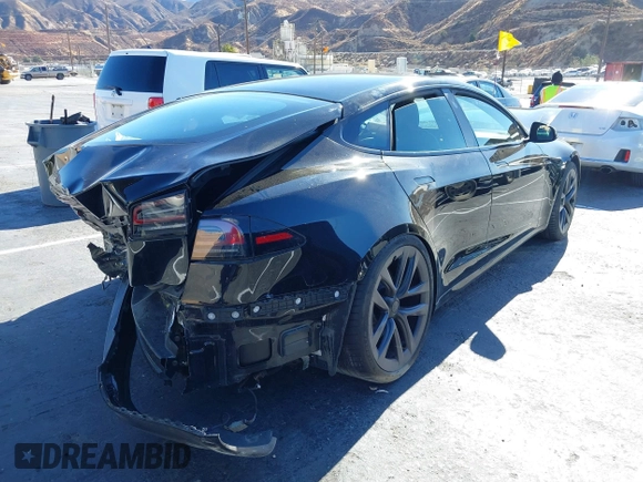 2022 Tesla Model S with VIN 5YJSA1E52NF476906, listed as a IAAI auction lot 41320074 with Not Provided miles and . Bid and sale history available at DreamBid. Image 4.